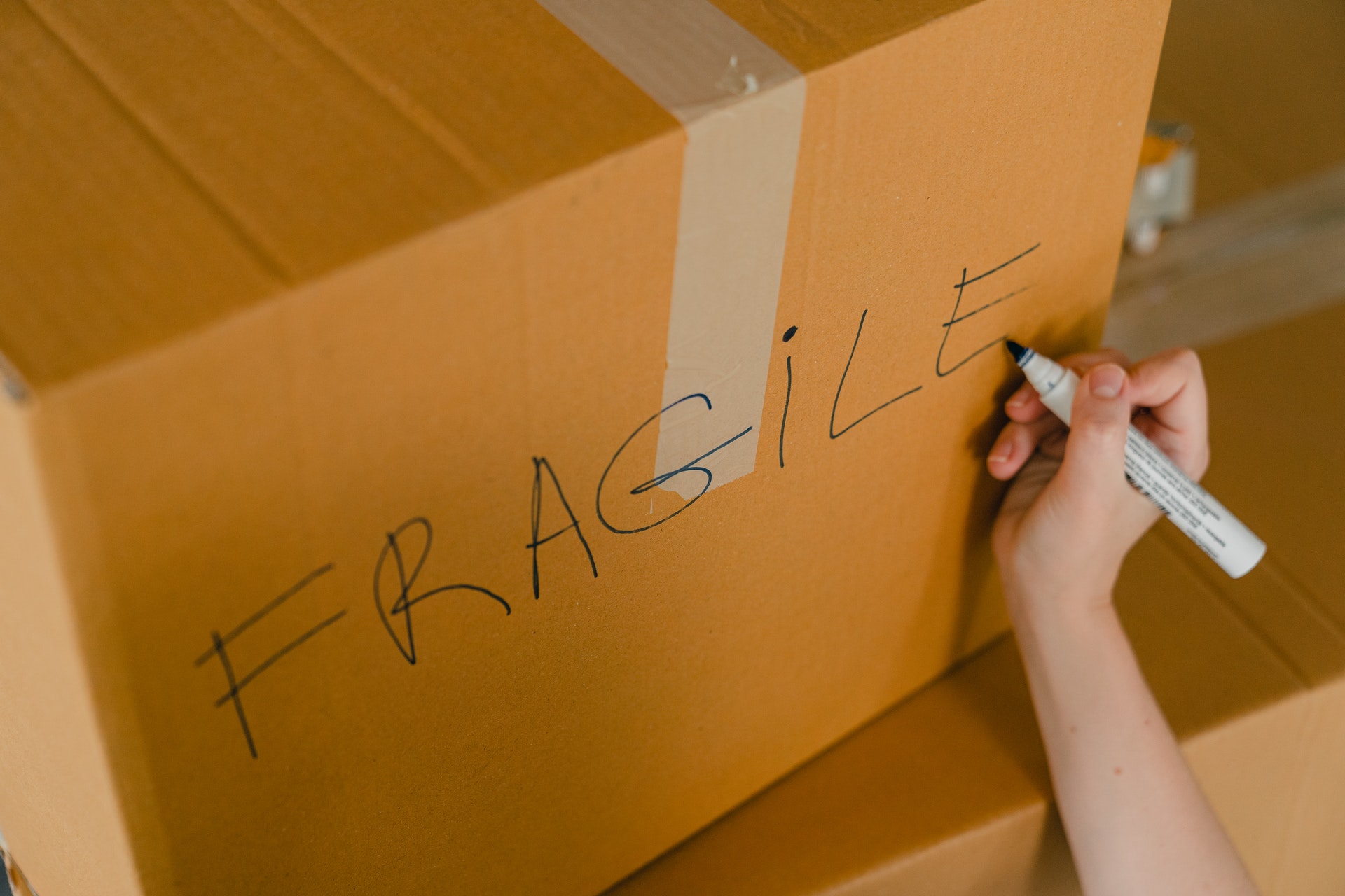 A package with the  word "fragile" written on it